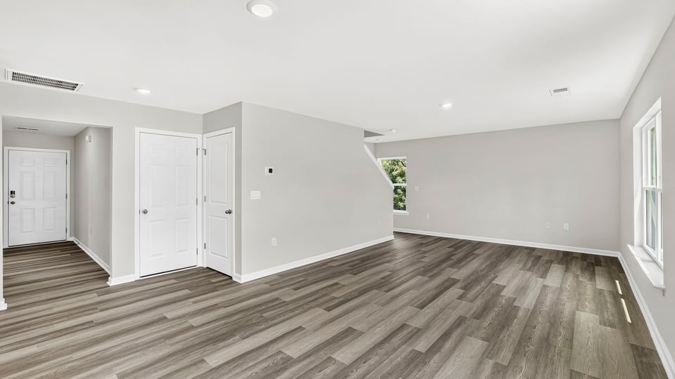 Family room with windows.