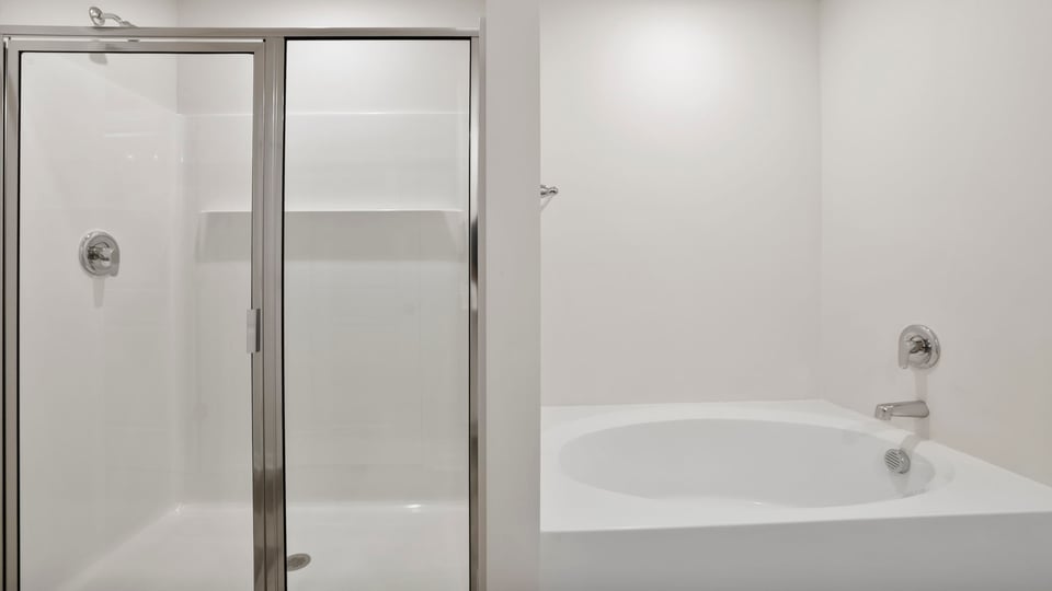 Bathroom with walk in shower.