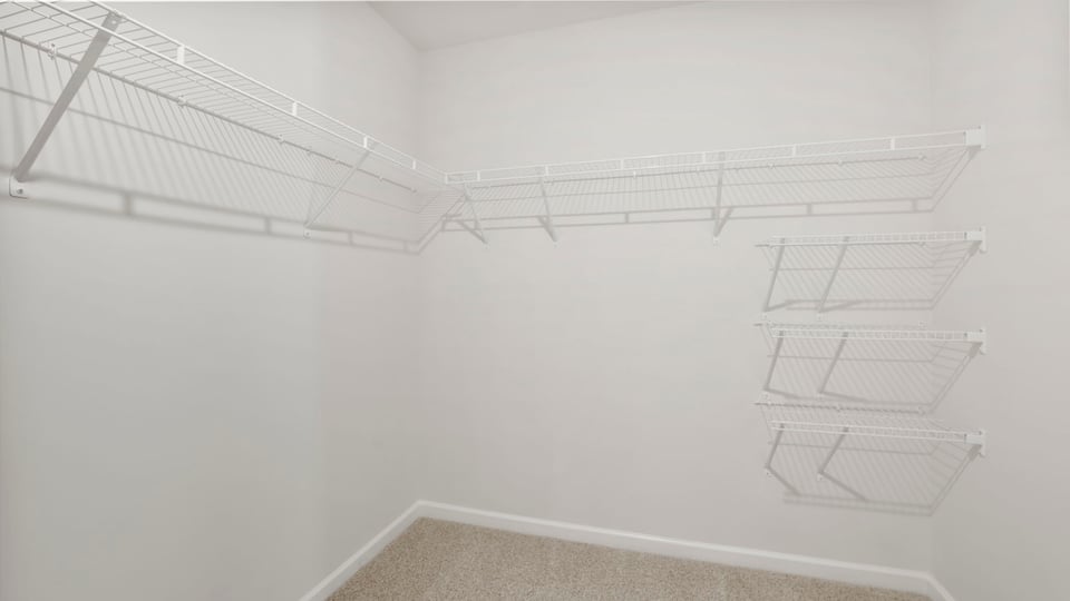 Closet with hanging storage racks.