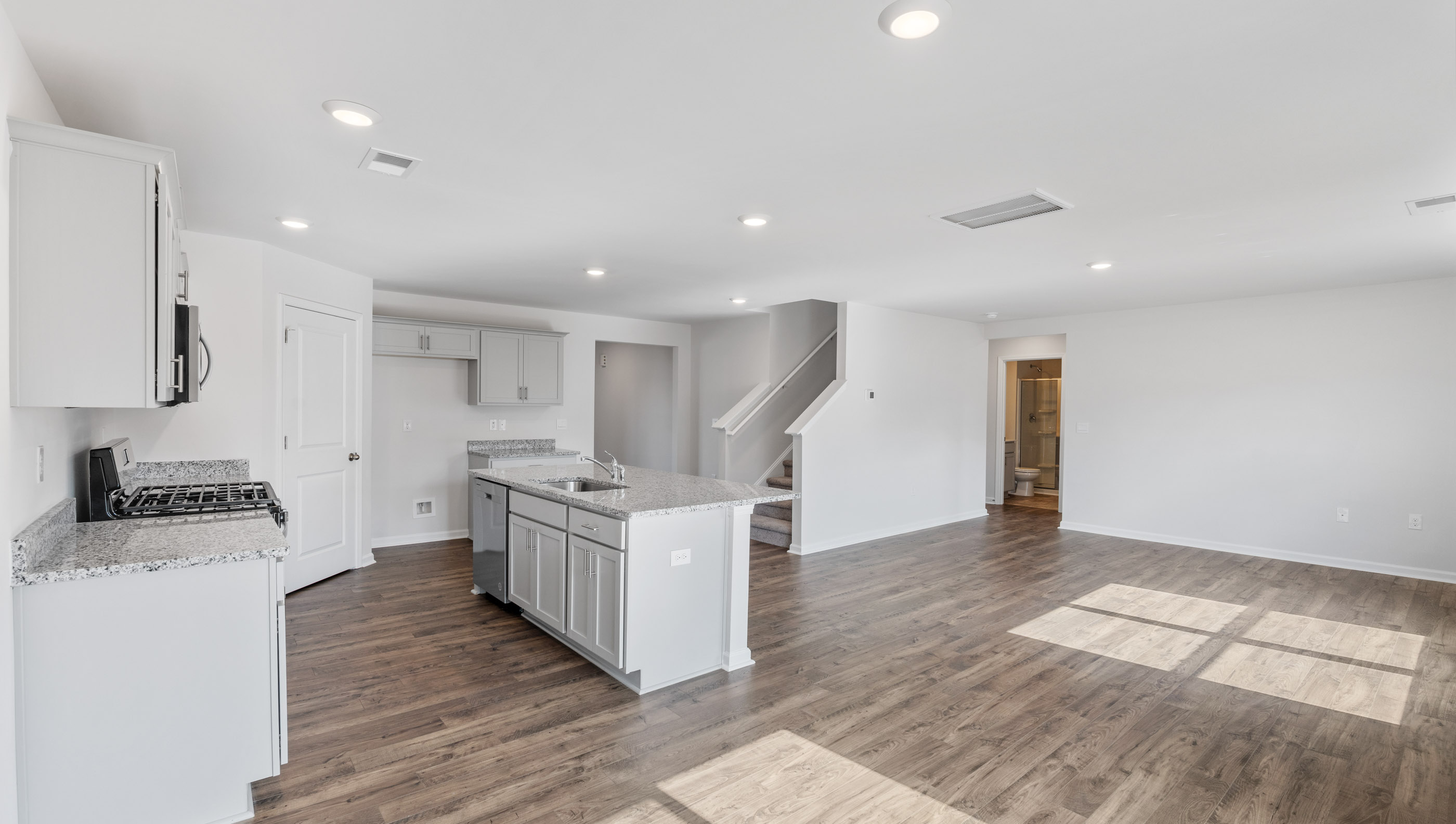 Kitchen with island and countertops.