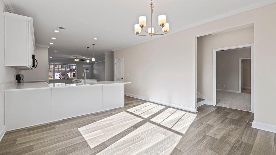 View of the dining area and back stairwell.