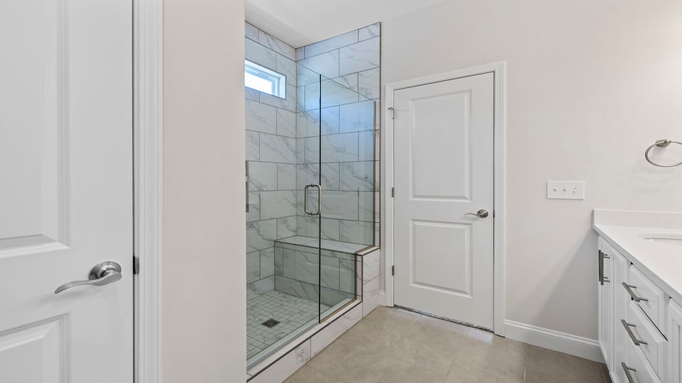 Primary bathroom walk-in shower.
