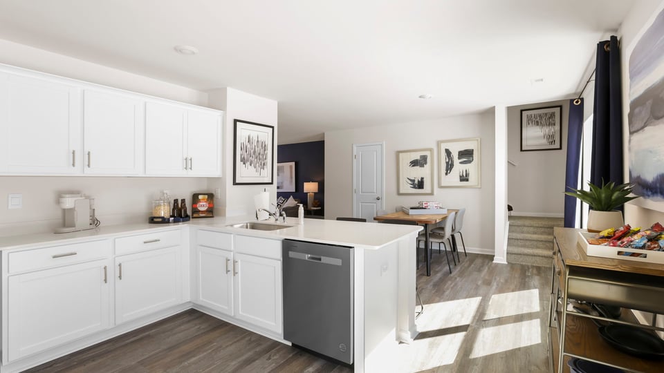 Kitchen with island and cabinets.