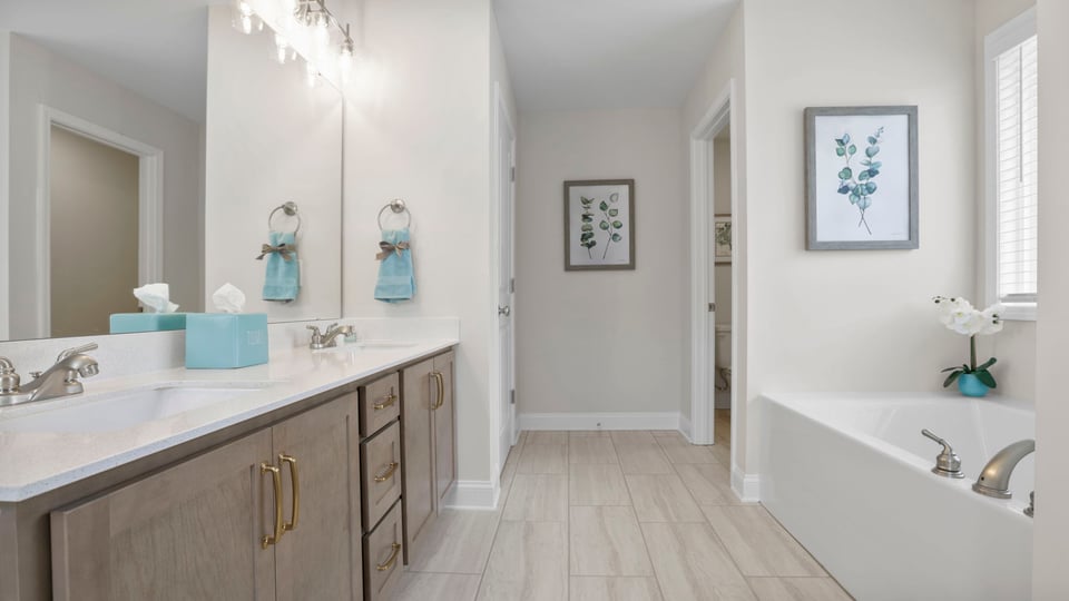 Primary bathroom with double vanity sink.