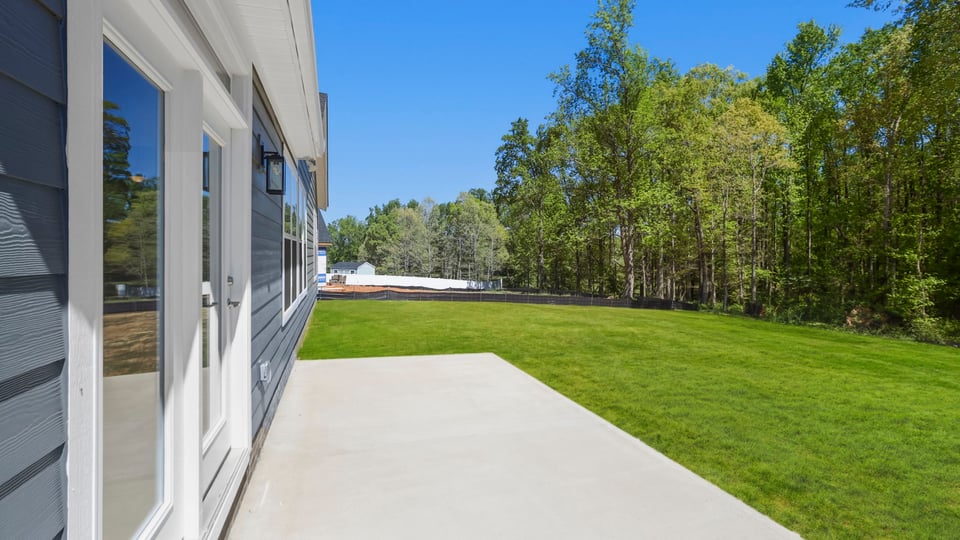 Back exterior with patio.