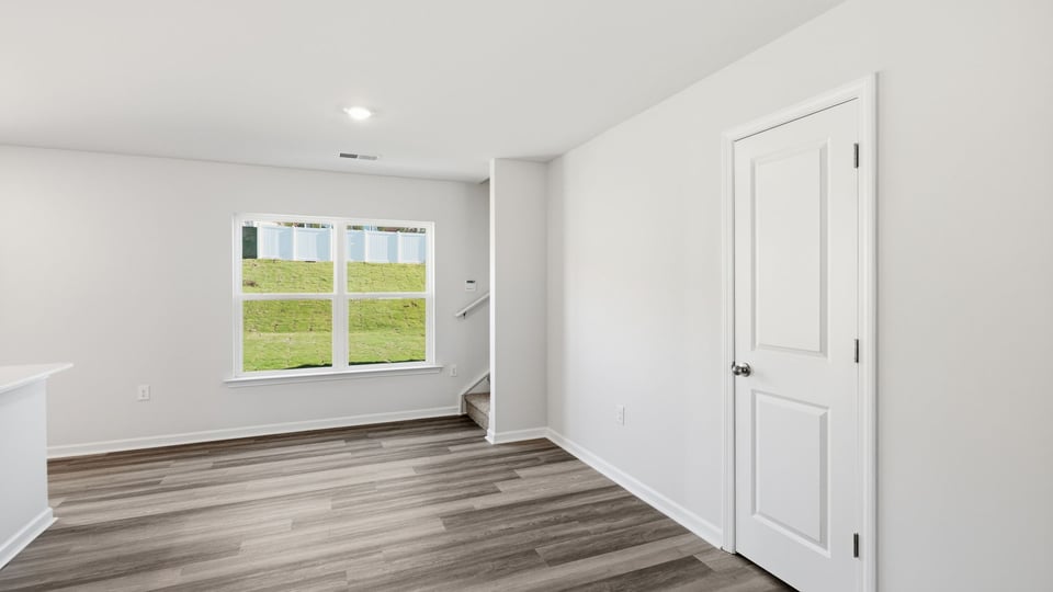 Foyer and living room of home.