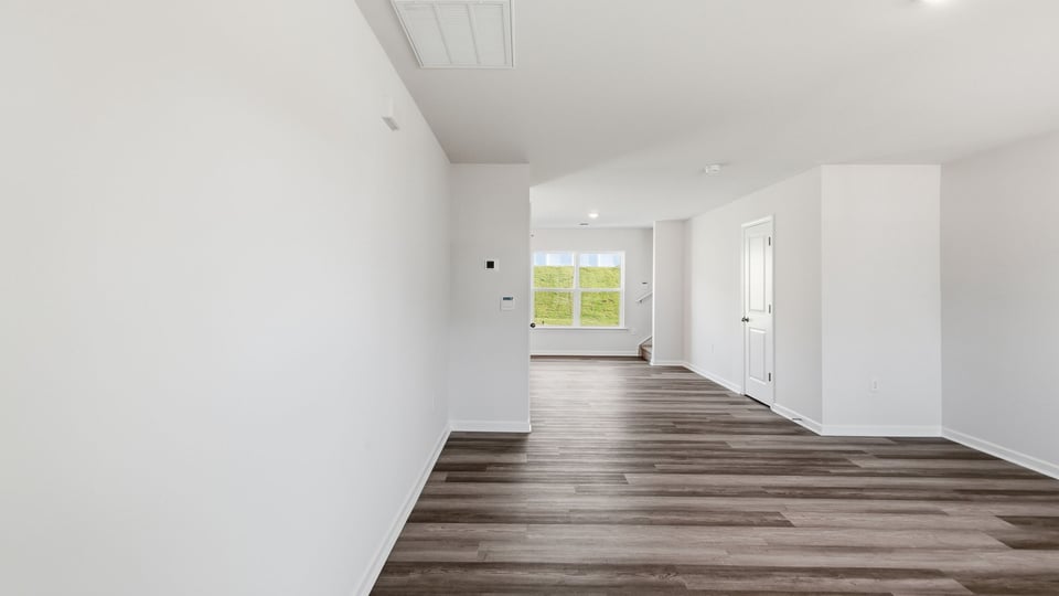Foyer and living room of home.