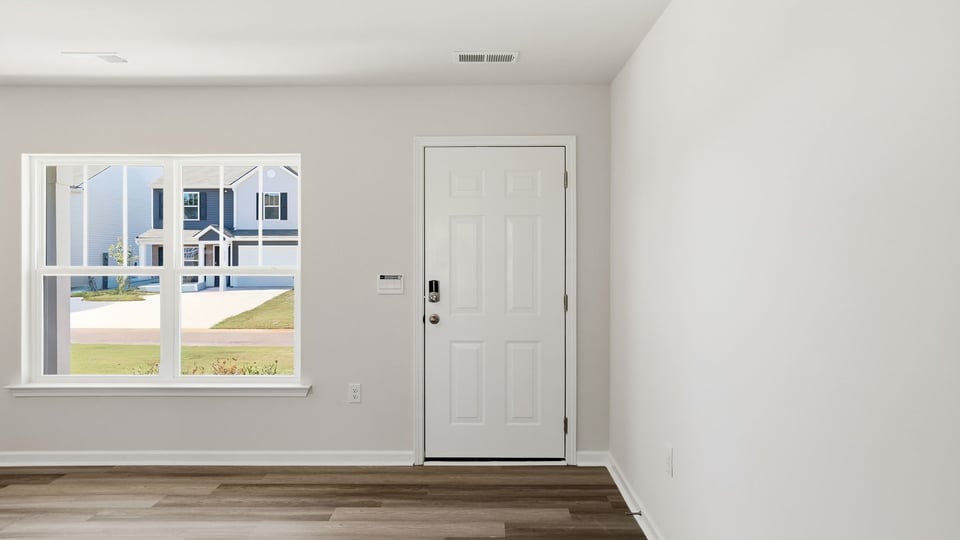 Foyer and living room of home.