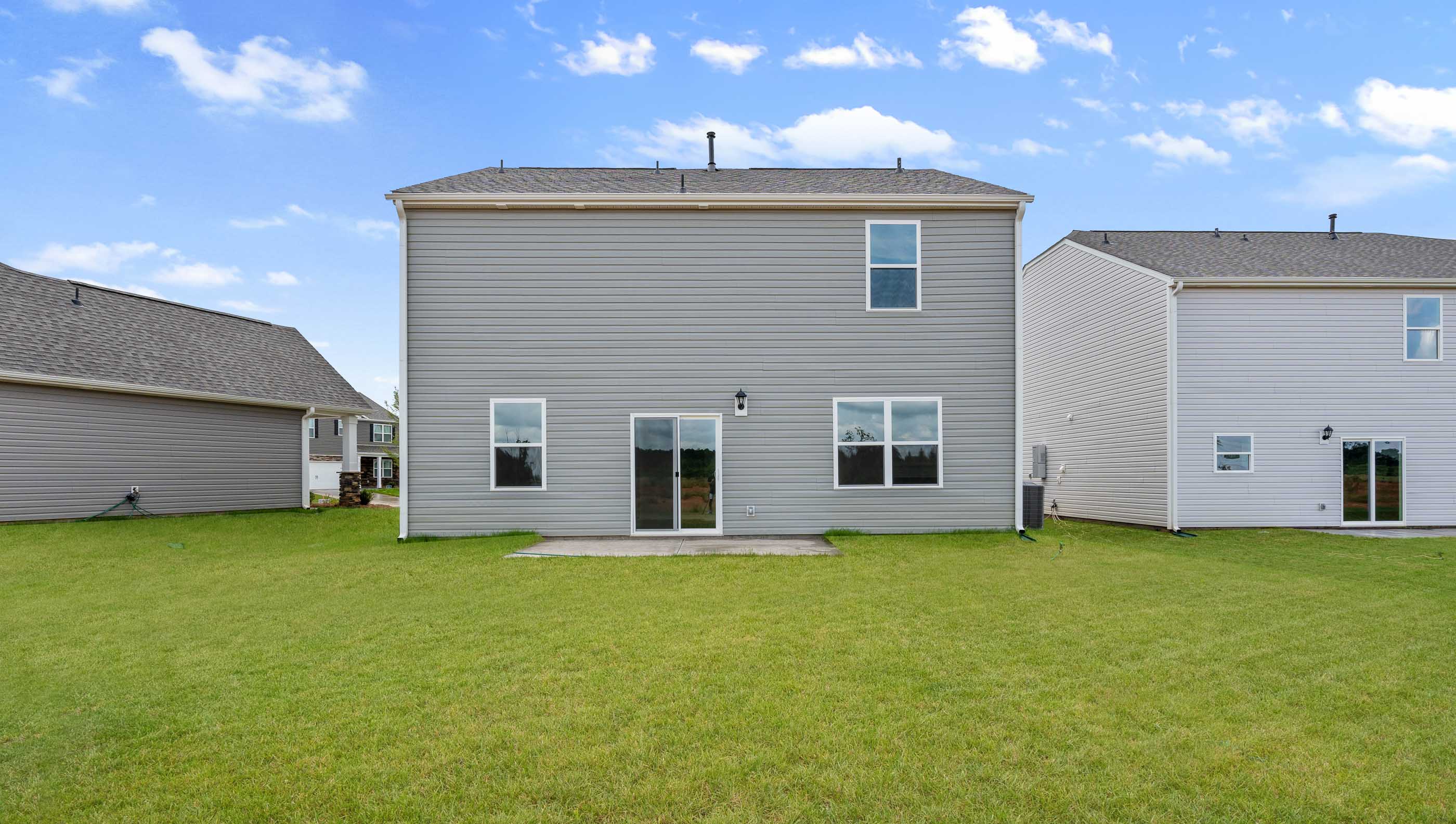 Large backyard of home.