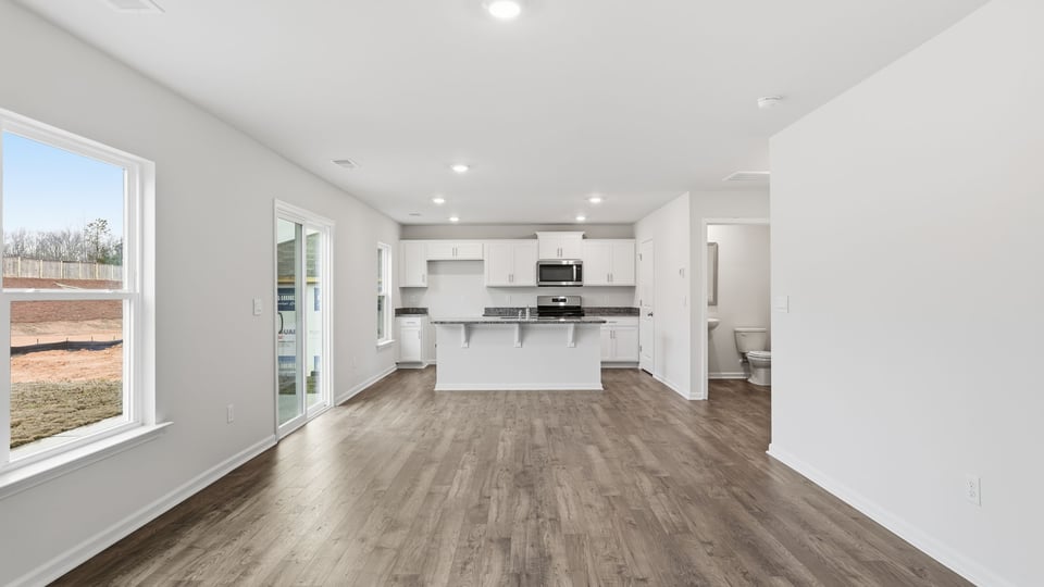 Kitchen with island and windows.