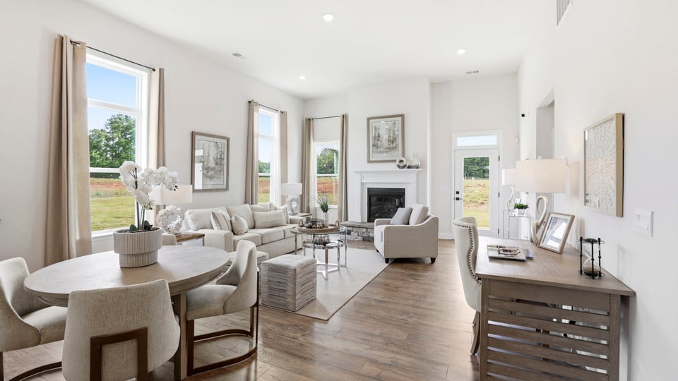 Livingroom with windows and fireplace.