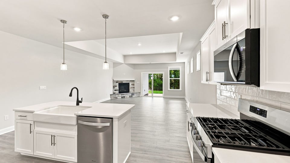 View of kitchen with island.