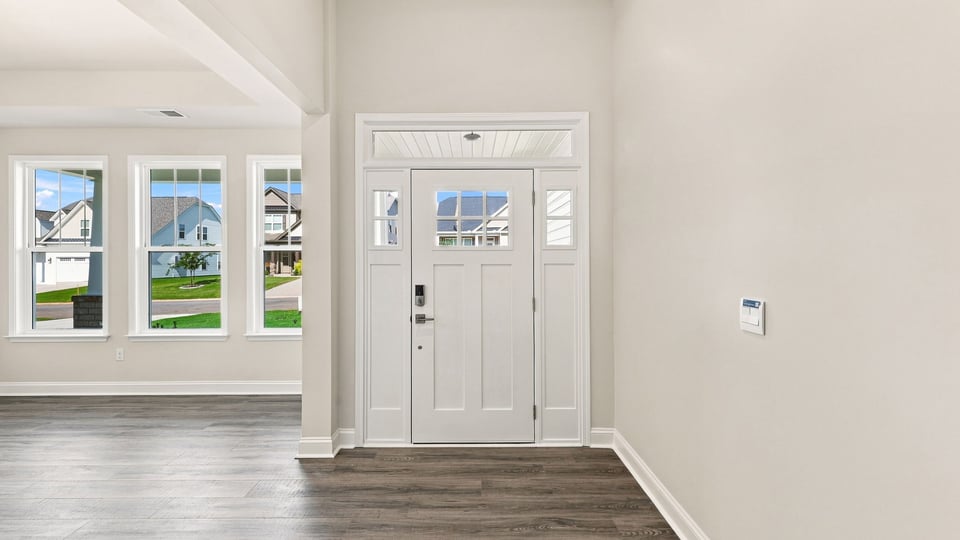 View of entrance and formal dining room.