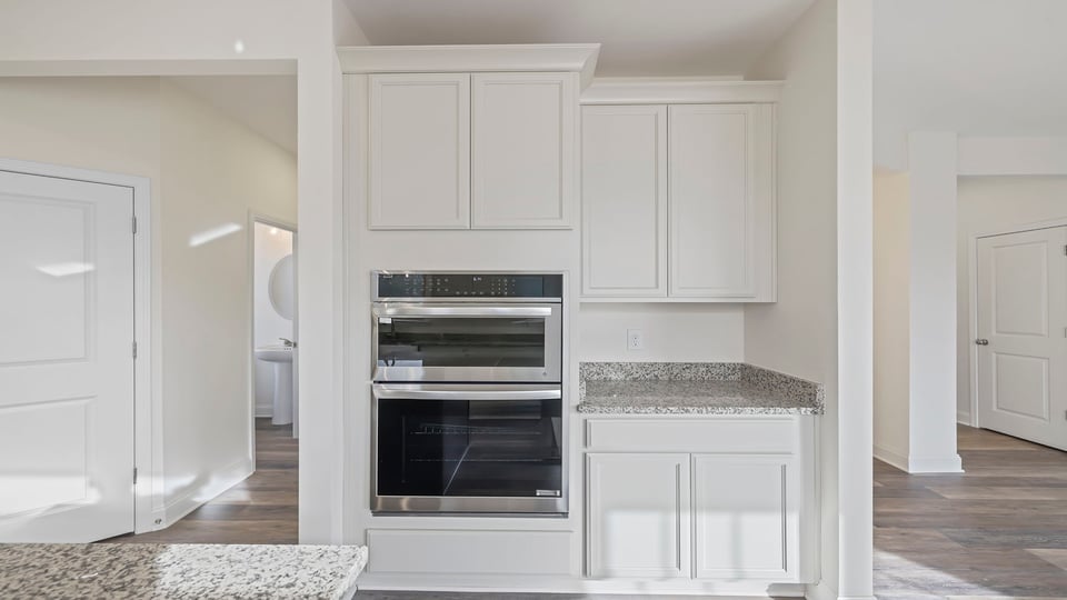 Kitchen with quartz countertops.