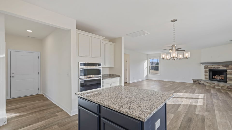 Kitchen with quartz countertops.