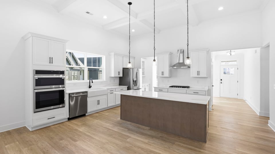 Kitchen with island and countertops.