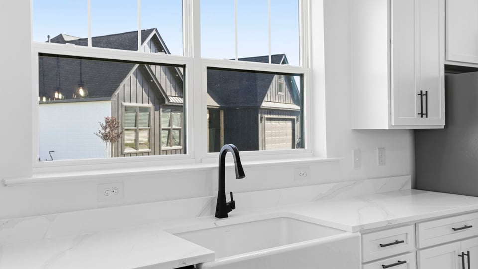 Kitchen with island and countertops.
