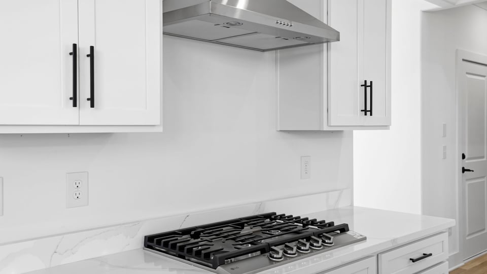 Kitchen with island and countertops.