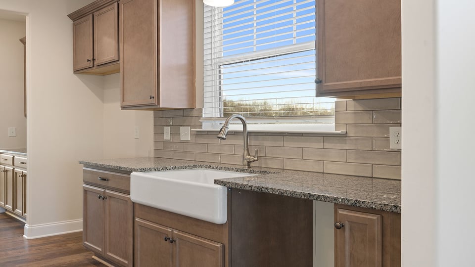 Kitchen with stainless steel appliances.