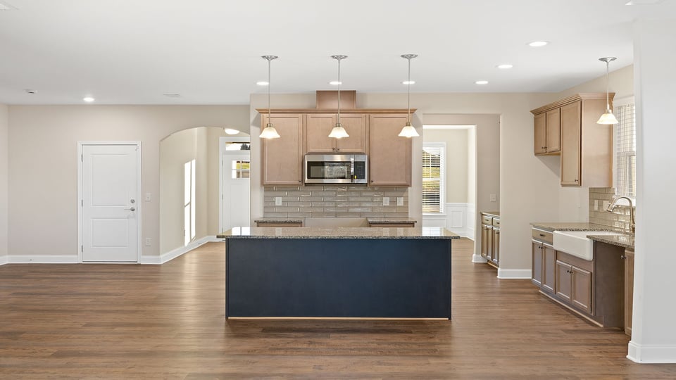 Family room with view of kitchen.