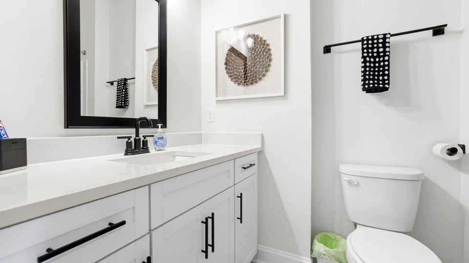 Bathroom with vanity and toilet.