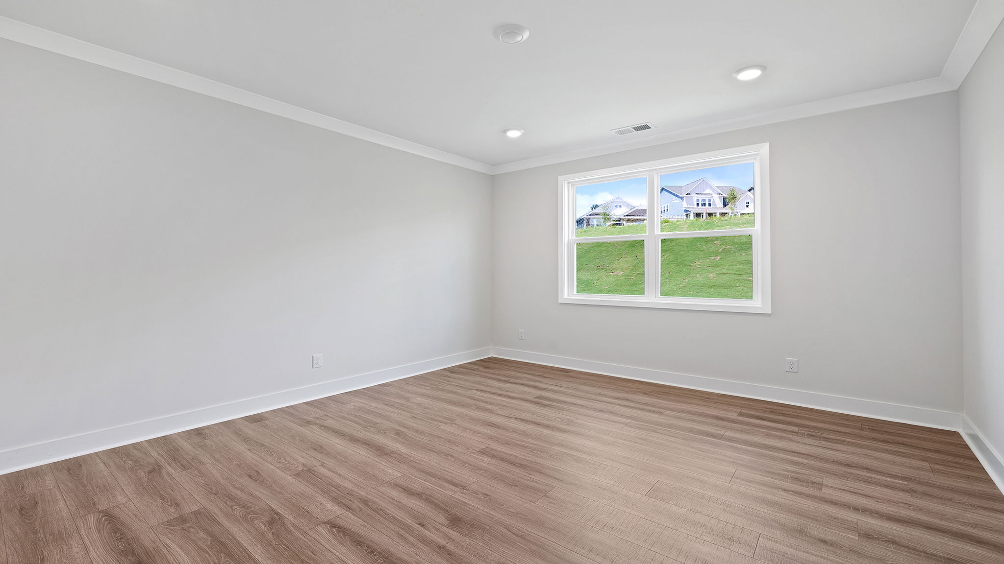 Bedroom with window and closet.