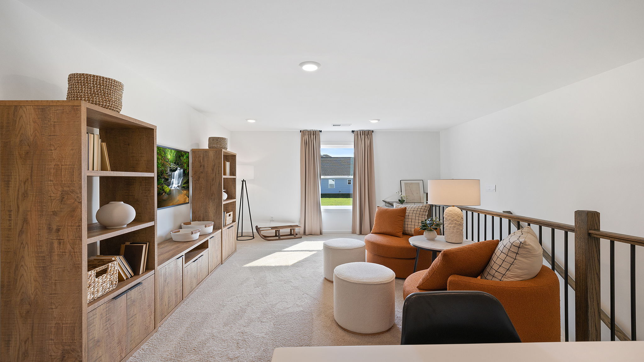 Loft with carpet and windows.