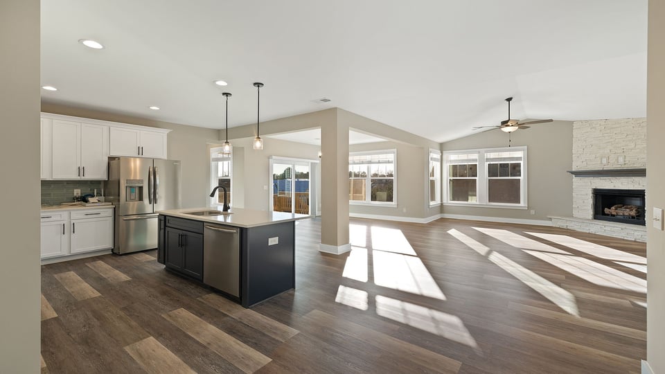 Kitchen with island and cabinets.