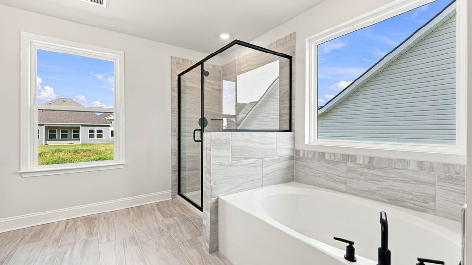 Primary bathroom with double vanity sinks.