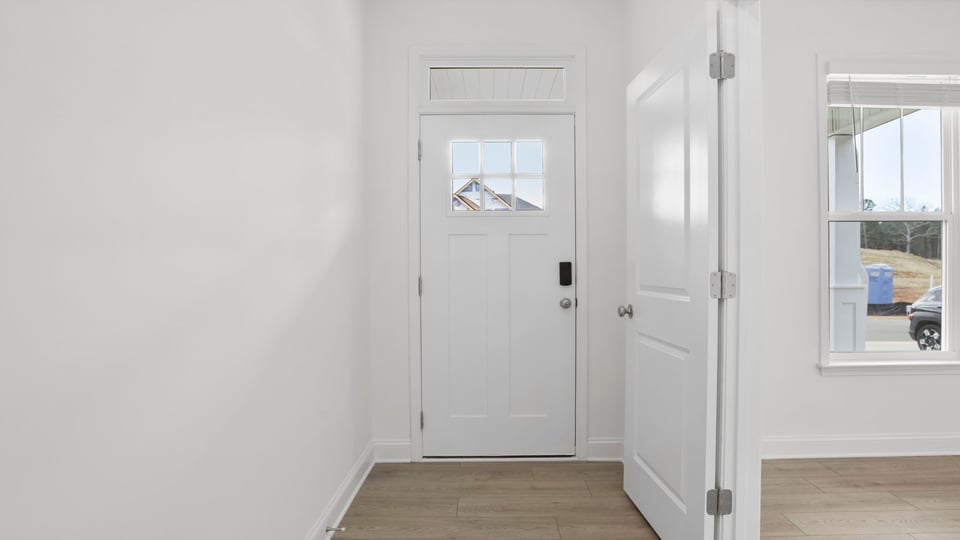 View of the entrance and the office at the front of the home.