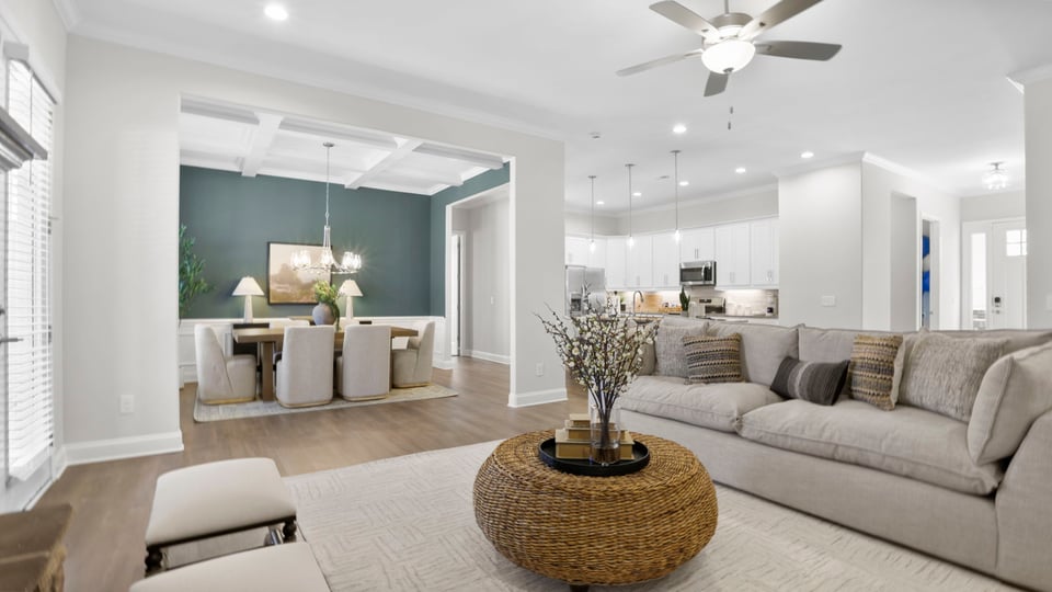 Living area with fireplace and windows.