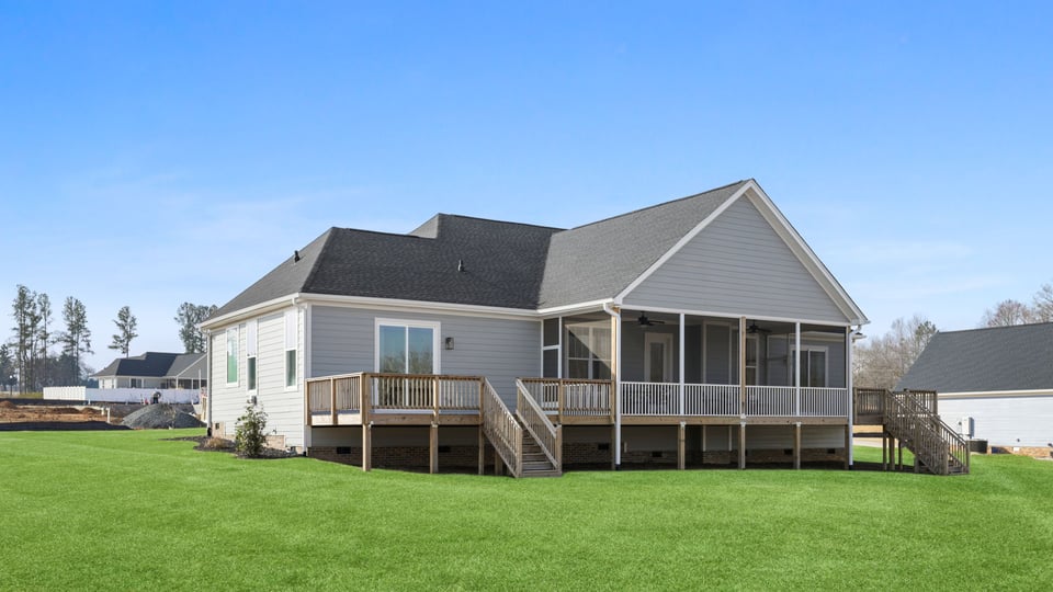 Back exterior with large backyard.