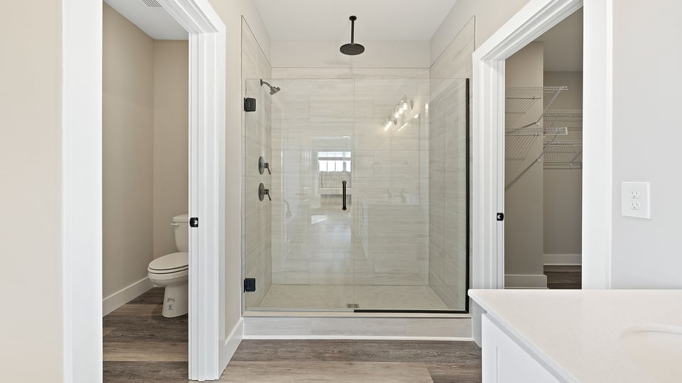 Primary bathroom with double vanity sinks.