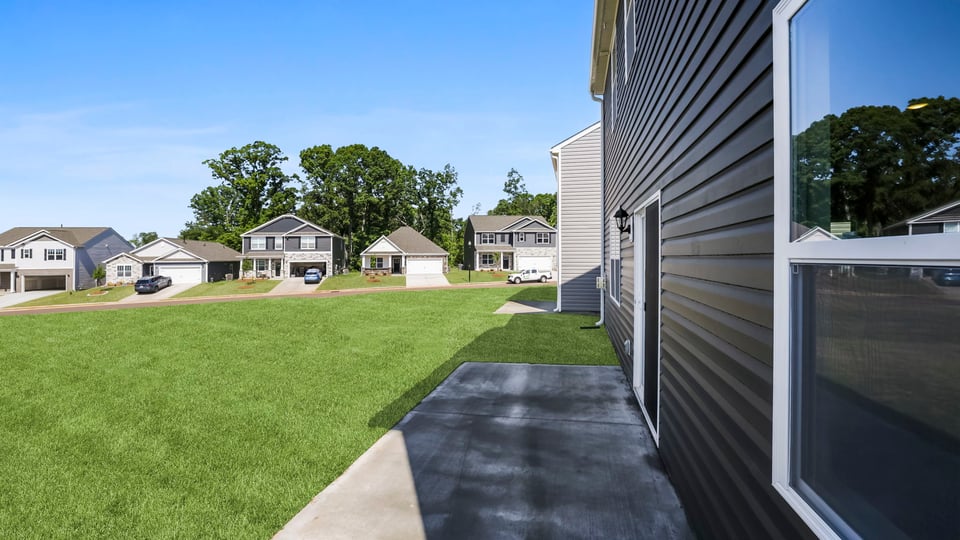 Large backyard of home.