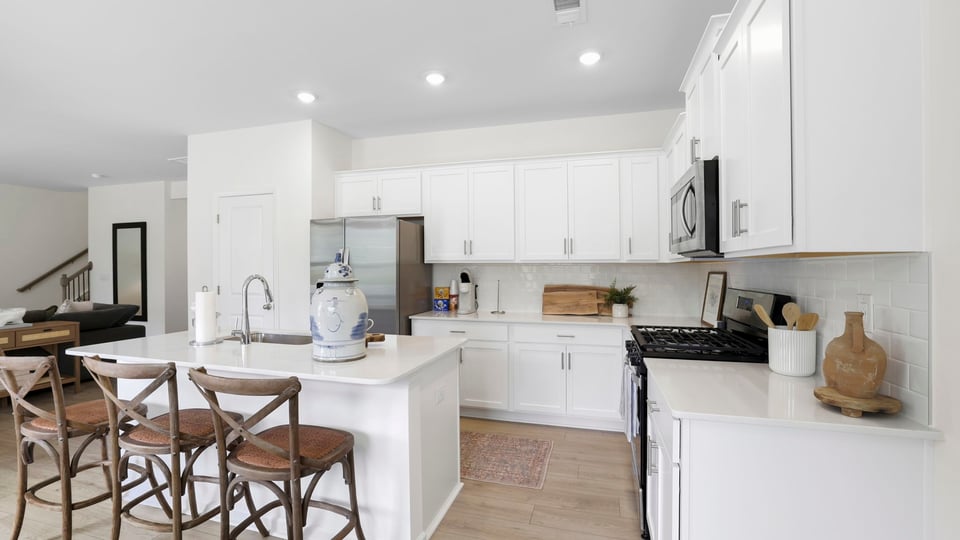 Kitchen with island and countertops.