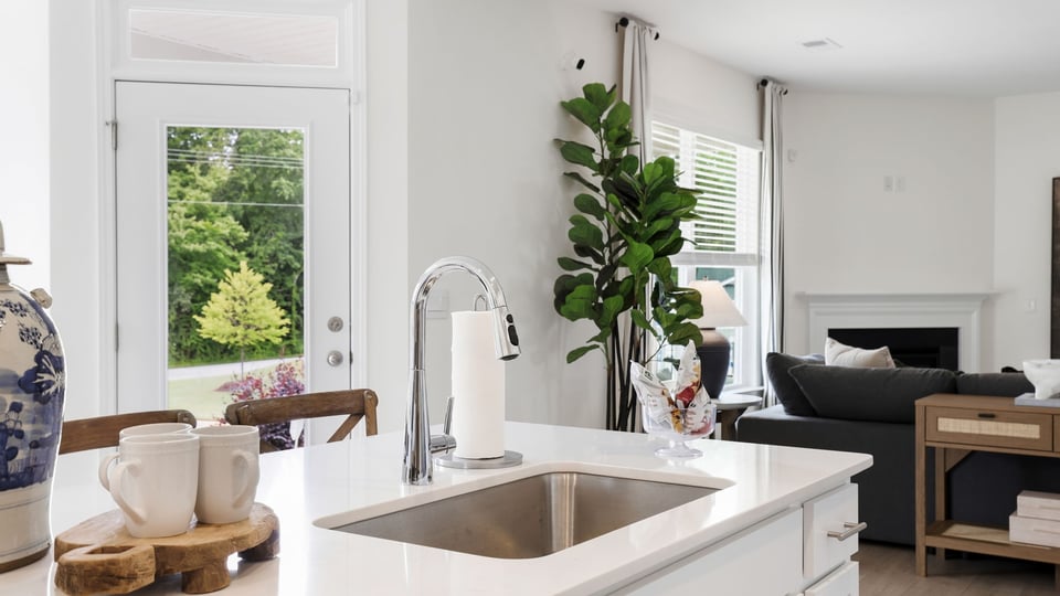 Kitchen with island and countertops.
