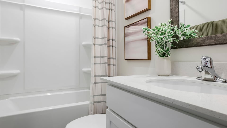 Bathroom with vanity and tub.