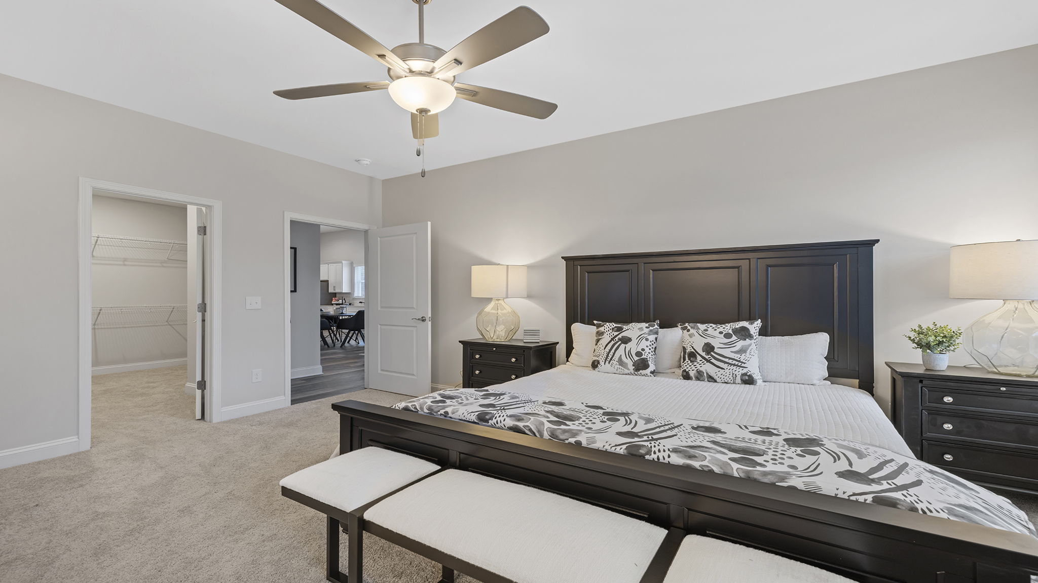 Bedroom with window and carpet.