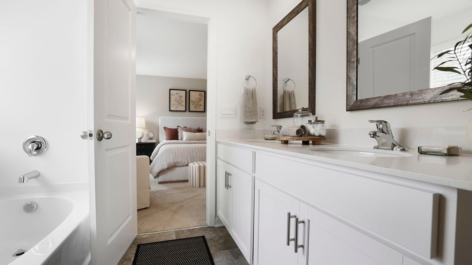 Bedroom with carpet and window.