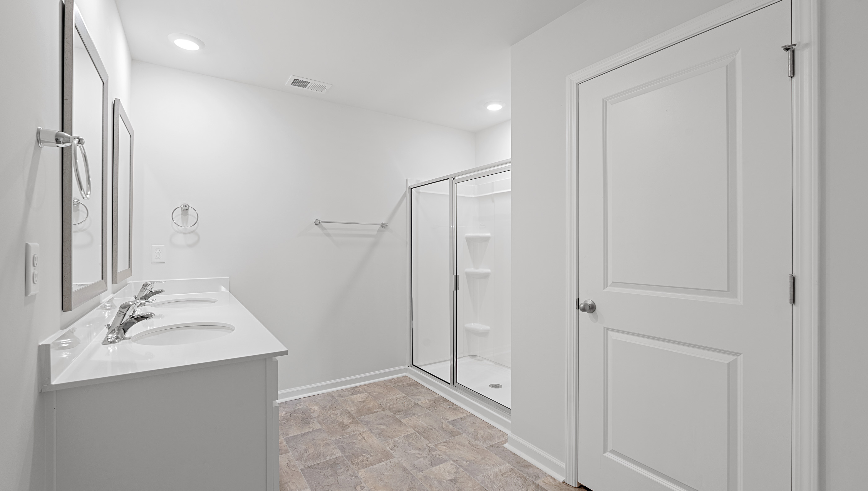 Double vanity with walk in shower.