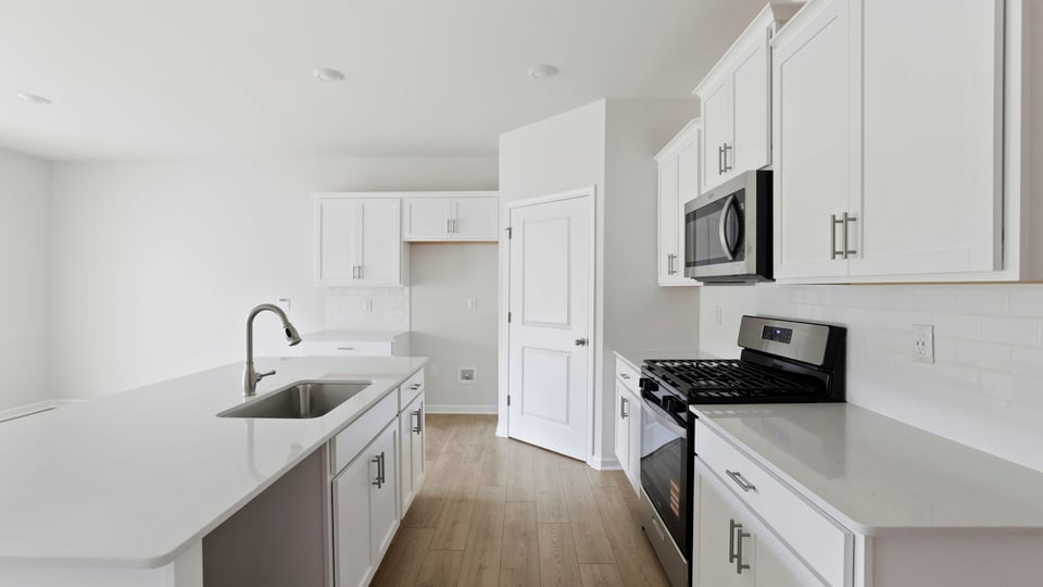 Side full view kitchen and pantry