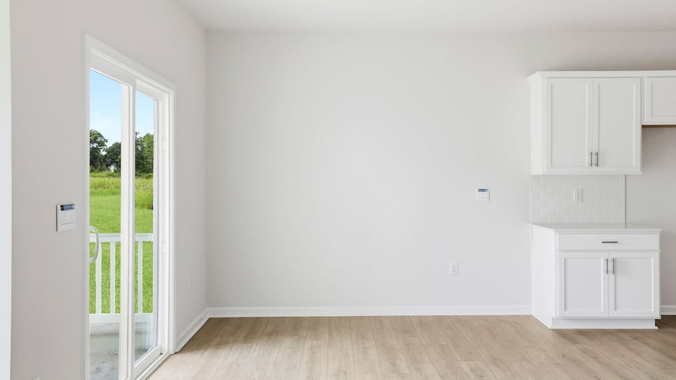 View of dining area and sliding glass back door
