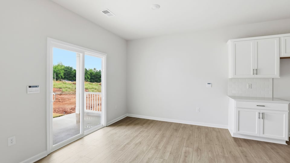 View of dining area and sliding glass back door