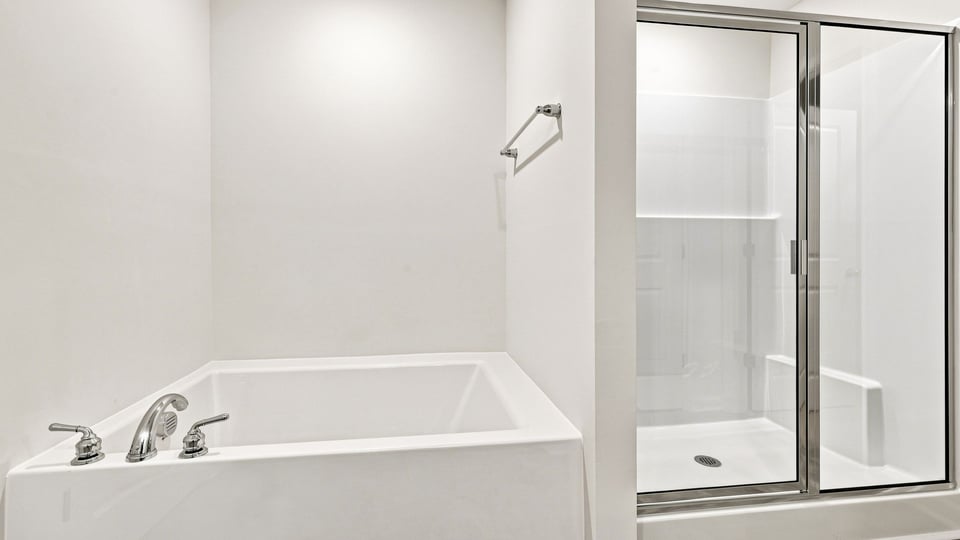 Primary bathroom with double vanity sink.