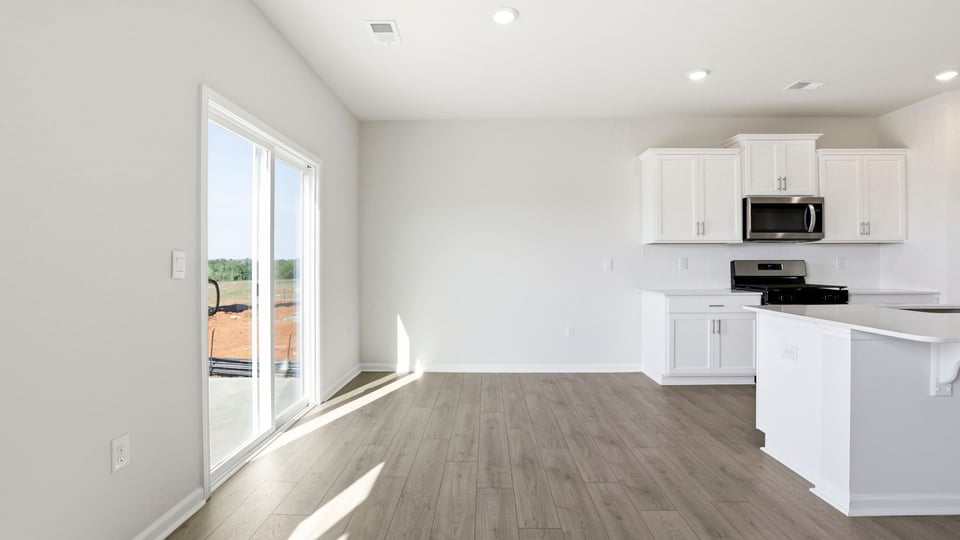 Livingroom with windows and firplace.