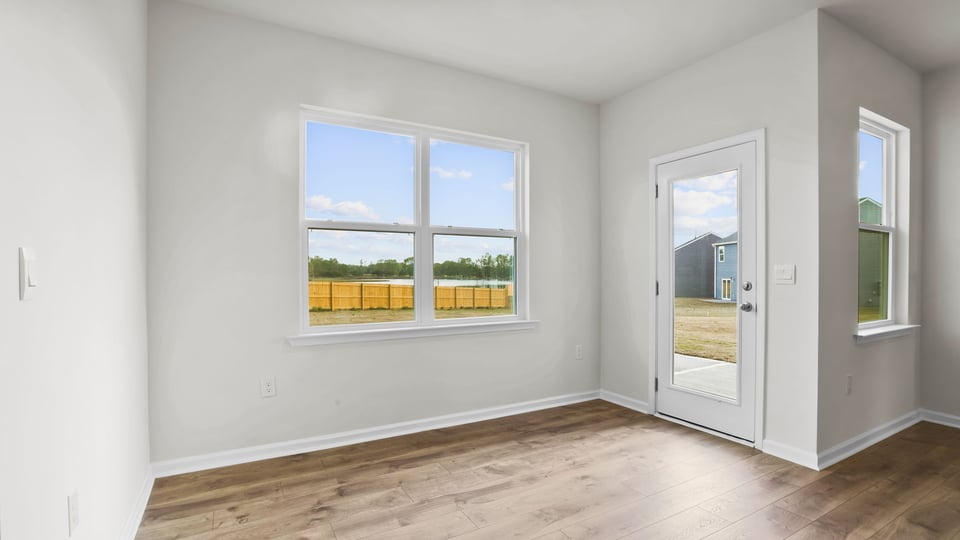Diningroom area with sliding door.