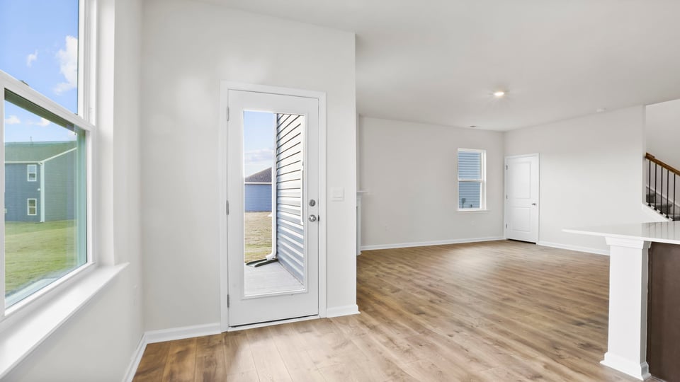 Diningroom area with sliding door.