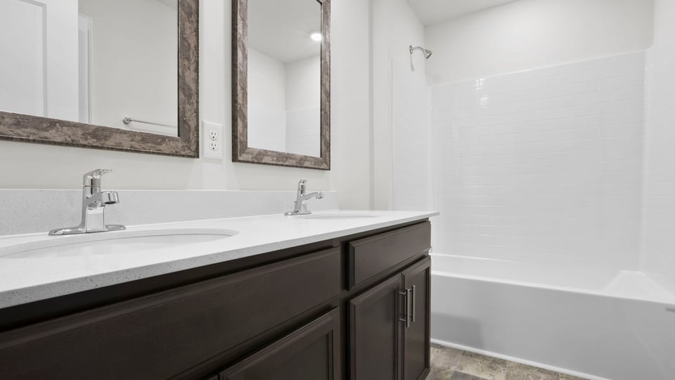 Bathroom with vanity and tub.