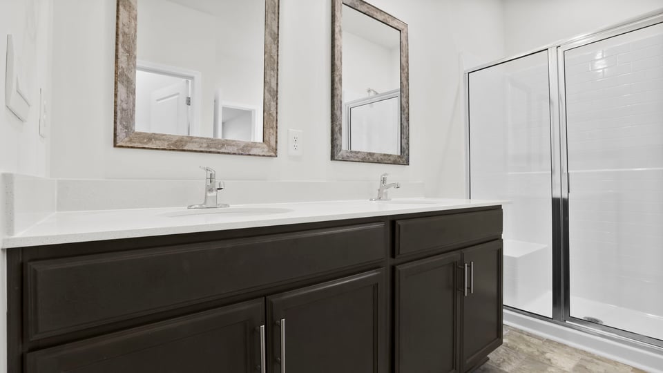 Bathroom with tub and walk in shower.