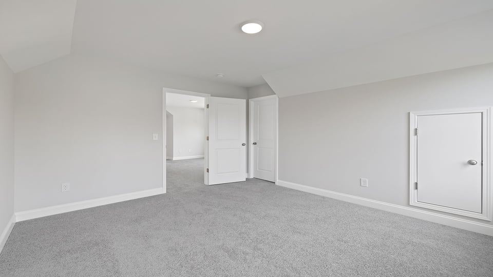 Bedroom with carpet.